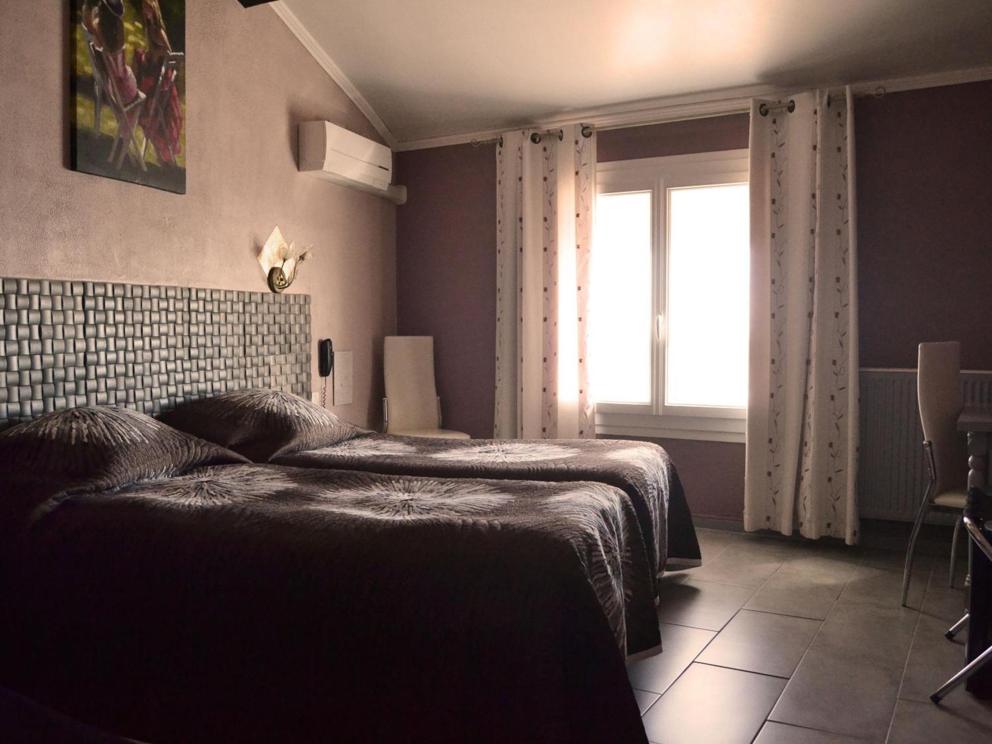 Hotel Le Dauphin Bleu Saintes-Maries-de-la-Mer Habitación foto