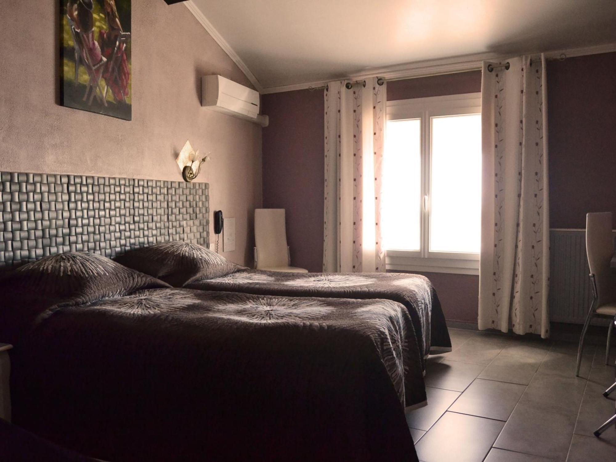 Hotel Le Dauphin Bleu Saintes-Maries-de-la-Mer Habitación foto
